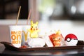 Happy Meal set at McDonald`s and Pokemon plastic toys Royalty Free Stock Photo