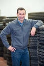 happy mechanic in garage Royalty Free Stock Photo