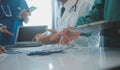 Happy medical team having a meeting in conference room in hospital. Doctors at briefing in hospital office Royalty Free Stock Photo