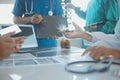 Happy medical team having a meeting in conference room in hospital. Doctors at briefing in hospital office Royalty Free Stock Photo