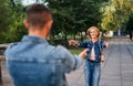 Happy meeting of two lovers hugging in the street Royalty Free Stock Photo