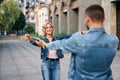 Happy meeting of two lovers hugging in the street Royalty Free Stock Photo