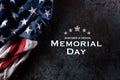 Happy Memorial Day. American flags with the text REMEMBER & HONOR against a black stone texture background. May 25 Royalty Free Stock Photo