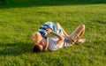 Happy father and son having fun outdoor on meadow Royalty Free Stock Photo