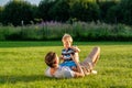 Happy father and son having fun outdoor on meadow Royalty Free Stock Photo