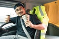 Happy men truck driver holding banknote US dollar