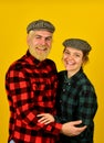 Happy man and woman checkered shirt and hat. Happy family concept. hippie and hipster. couple vintage fashion. follow