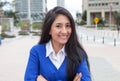 Happy mexican woman in the city Royalty Free Stock Photo