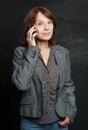Happy mid adult business woman cell phone. Royalty Free Stock Photo