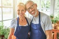 Happy middle aged caucasian couple in garden house Royalty Free Stock Photo