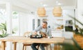 Middle aged Man taking care pot plants Royalty Free Stock Photo