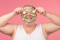 Man applies a mask of clay to cleanse the skin Grooming and skin care concept.