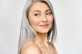 Happy middle aged mature asian woman portrait. Antiaging skincare ads. Royalty Free Stock Photo