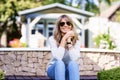 Happy middle aged woman relaxing in the garden at home Royalty Free Stock Photo