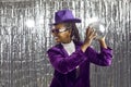 Happy black woman in costume hold disco ball Royalty Free Stock Photo