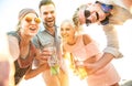 Happy millennial friends group taking selfie at fun beach party Royalty Free Stock Photo