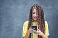 Happy millennial girl using mobile phone app for social media Royalty Free Stock Photo