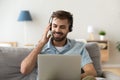 Excited man in headset listening to music online Royalty Free Stock Photo