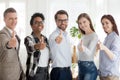 Happy millennial people standing showing thumbs up Royalty Free Stock Photo
