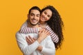 Happy Millennials. Beautiful Smiling Arab Couple Embracing And Looking At Camera Royalty Free Stock Photo