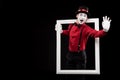 happy mime waving hand from frame