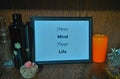 happy mind happy life .. Picture frame, decorative bottle and candle