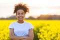 Happy Mixed Race African American Teenager Woman Yellow Flowers Royalty Free Stock Photo