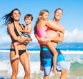 Happy Mixed Race Family on the Beach Royalty Free Stock Photo