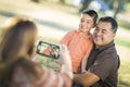 Happy Mixed Race Family Taking A Phone Camera Picture Royalty Free Stock Photo