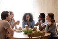 Happy mixed race group of best friends meeting.