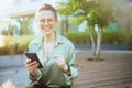 happy modern business woman in green blouse and eyeglasses Royalty Free Stock Photo