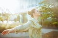 happy modern female worker near office building rejoicing Royalty Free Stock Photo