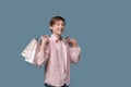 Happy modern funny man teenager in white t-shirt and pink shirt standing Royalty Free Stock Photo