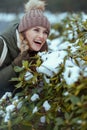 happy modern woman outdoors in city park in winter Royalty Free Stock Photo