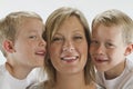 Happy Mom with 6 years old identical twins