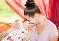 Happy mom and baby girl hugging and laughing. The concept of childhood and family. Royalty Free Stock Photo
