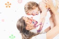 Happy mom and baby playing with painted face by paint Royalty Free Stock Photo