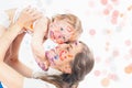 Happy mom and baby playing with painted face by paint Royalty Free Stock Photo