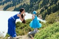 Happy mom and child girl hugging on nature The concept of childhood and famiy Royalty Free Stock Photo