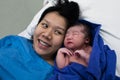 Happy mom and childbirth baby asian girl