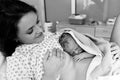 Happy mom, having her baby skin to skin first seconds after birth Royalty Free Stock Photo