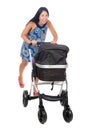 The happy mom with her baby in pram Royalty Free Stock Photo