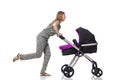 The happy mom with her baby in pram Royalty Free Stock Photo