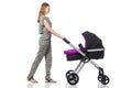 The happy mom with her baby in pram Royalty Free Stock Photo