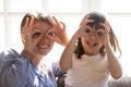 Happy mom and little daughter have fun at home Royalty Free Stock Photo