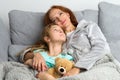 Mom sitting on couch with daughter