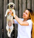 Happy moment - cute woman and her funny dog