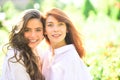 Happy moments of two girls in park. Closeup portrait funny joyful young women having fun, smiling, lovely moments, best Royalty Free Stock Photo