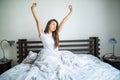 Happy morning of beauty woman streching in bed at home Royalty Free Stock Photo