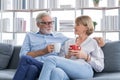 Happy morning, caucasians senior lover couple family. Mature, adult retired man, woman drinking coffee, tea together, embracing, Royalty Free Stock Photo